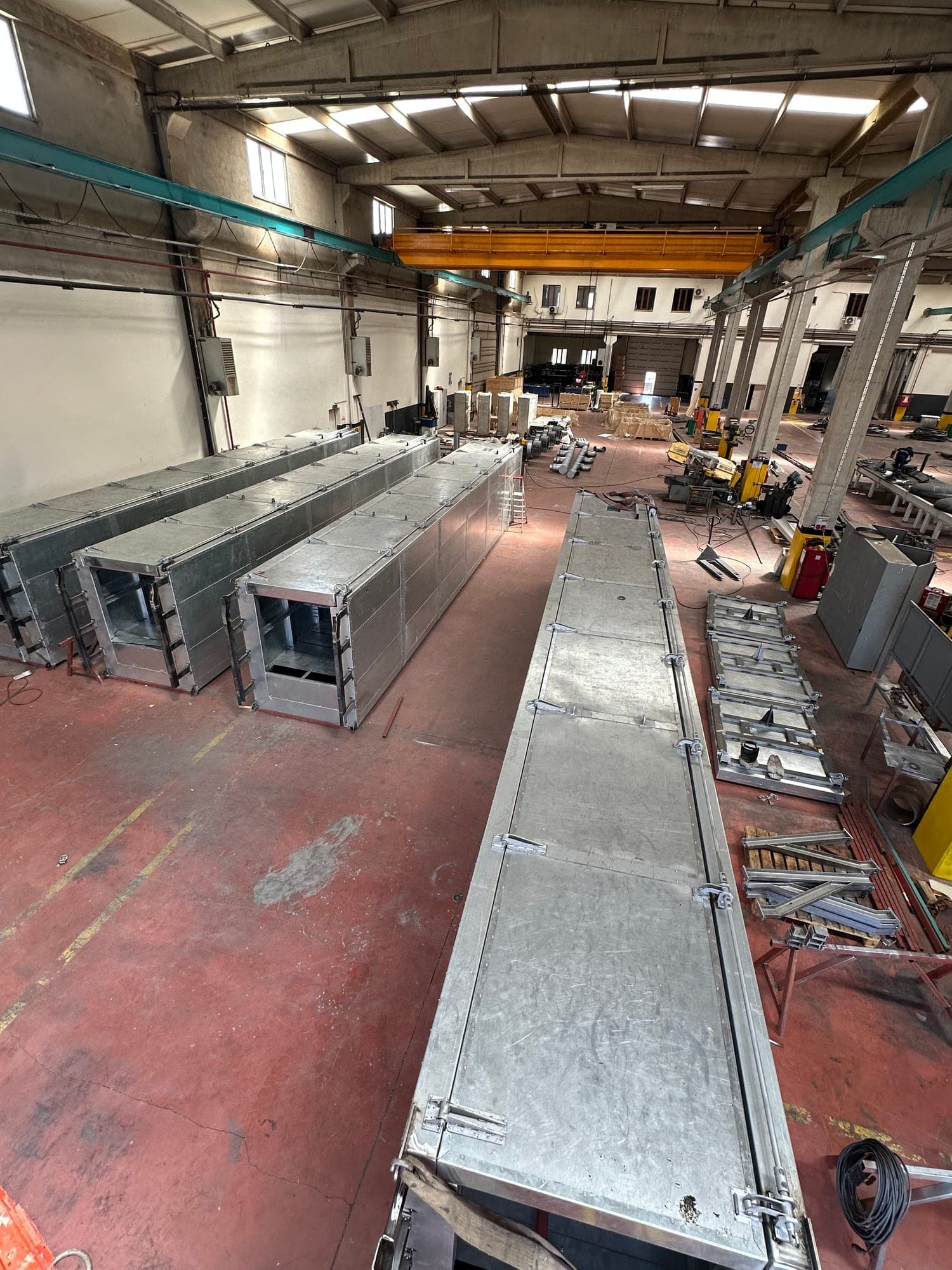 Oven ducting sections laid out in the fabrication hall